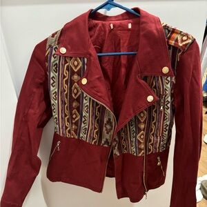 Brand unknown. Super comfy jacket with cute design. Like new condition. No tags